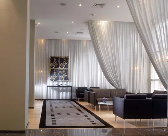 Luxury Curtain Tracks with flowing curtains