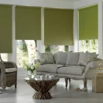 Roller blinds in lime and shades of grey with wicker chair
