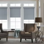 Grey blinds in Traditional window frames with elegant furniture