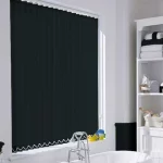 Vertical blinds in black in white bathroom