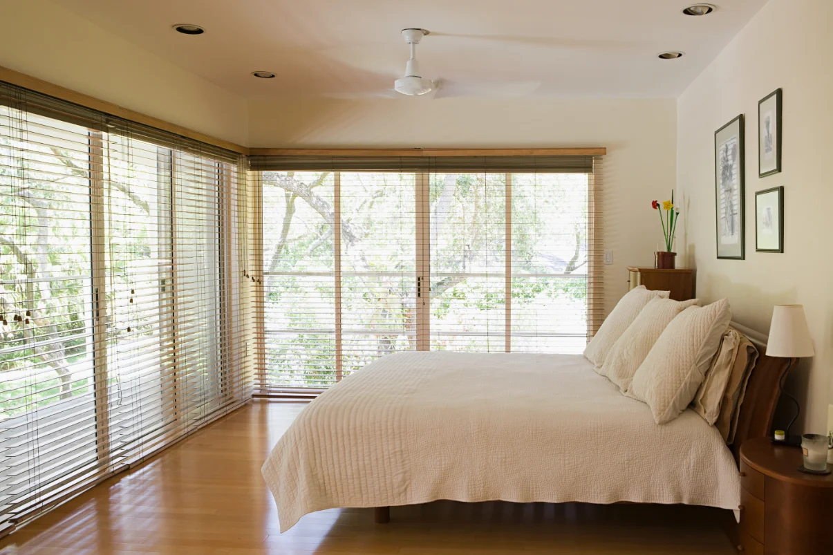 Wood Venetian in bedroom full height to floor